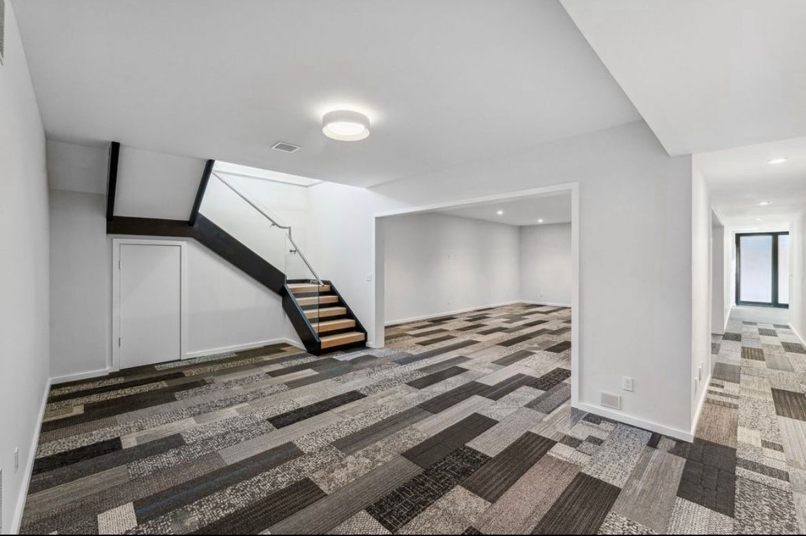 There is a staircase in the middle of the room