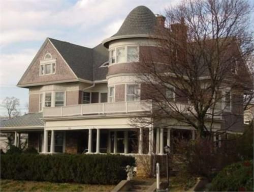 A large brick house with a dome shaped roof