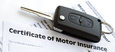 Car Key and certificate of motor Insurance