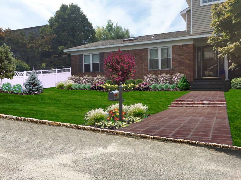 A brick house with a mailbox in front of it