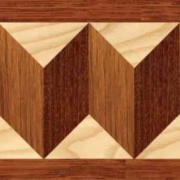 Wood flooring border with alternating light and dark brown chevron pattern.