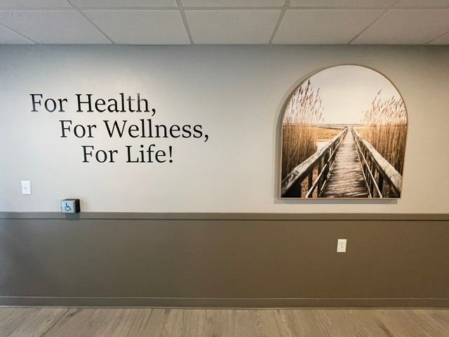 A sign on a wall that says 