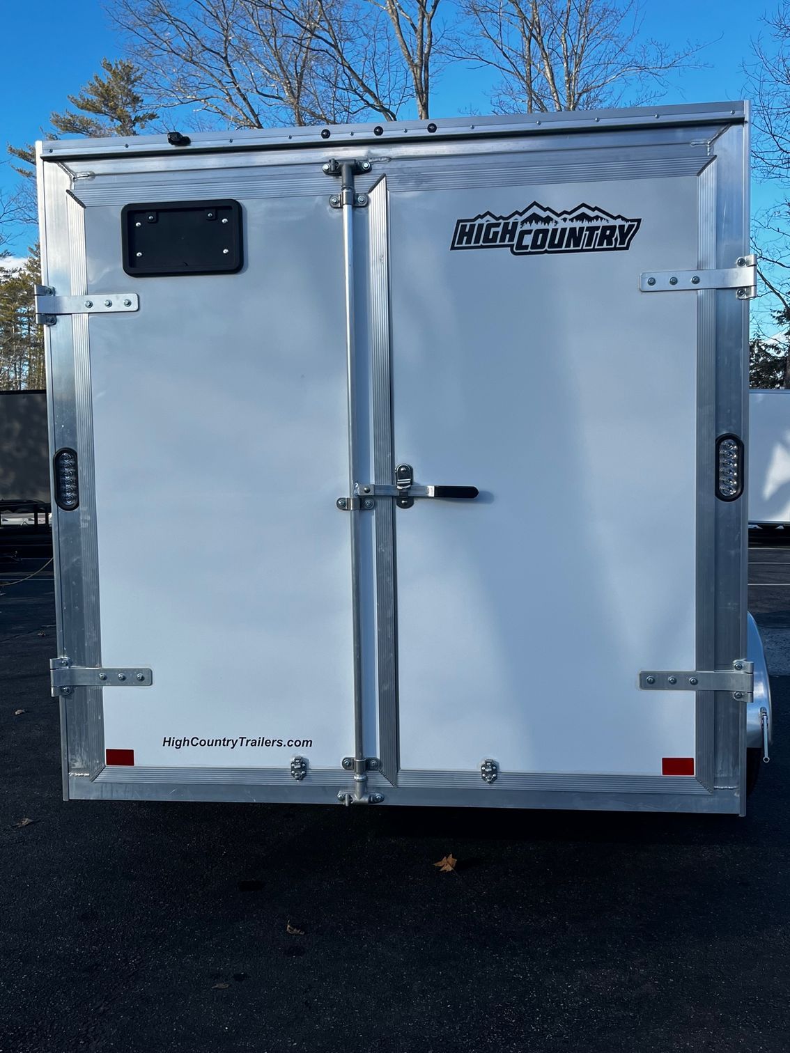 A white trailer with the word mountain on it