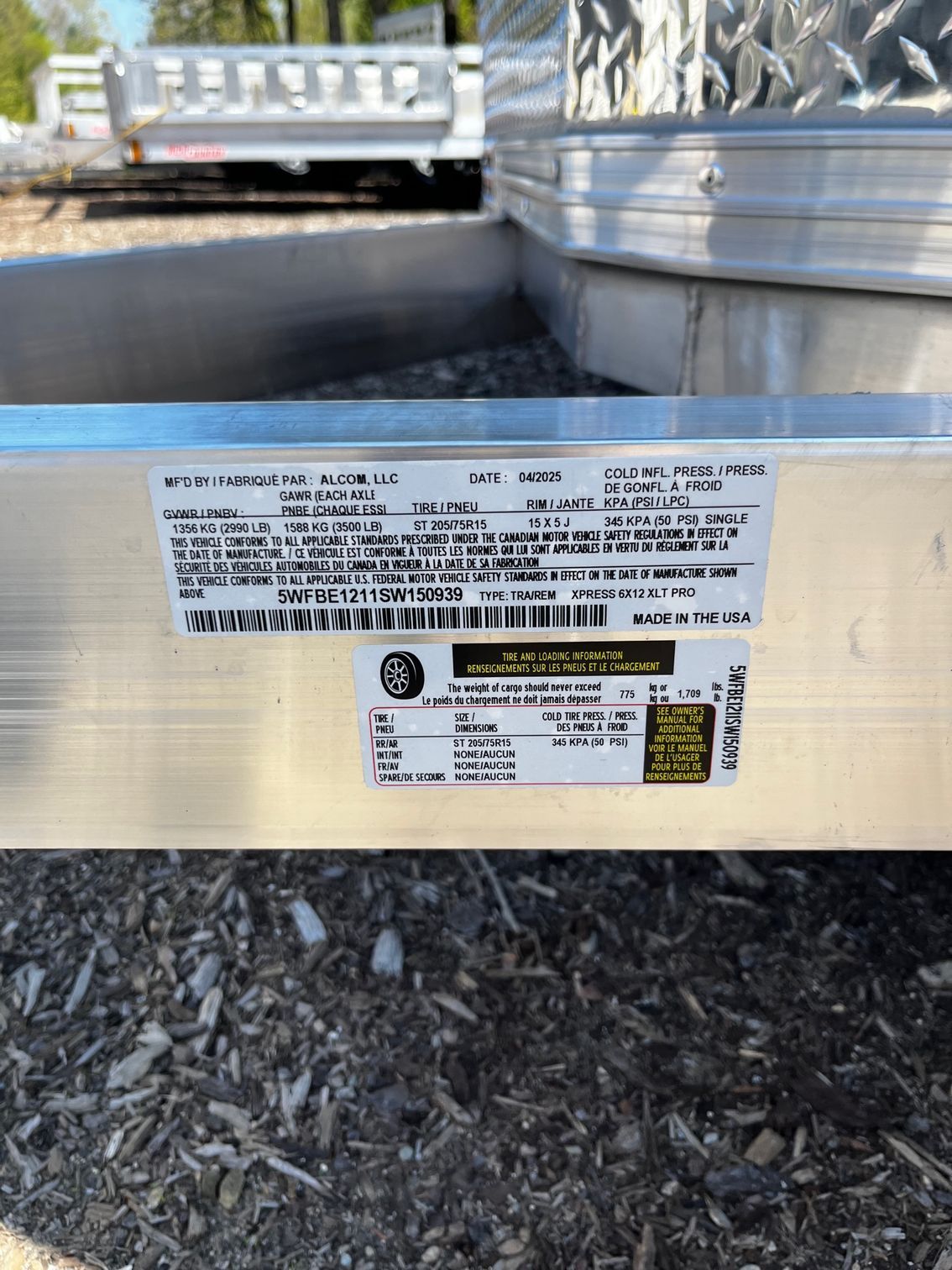 A close up of a metal item with a label on it.