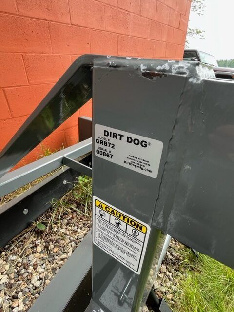A dirt dog item with a caution sticker on it