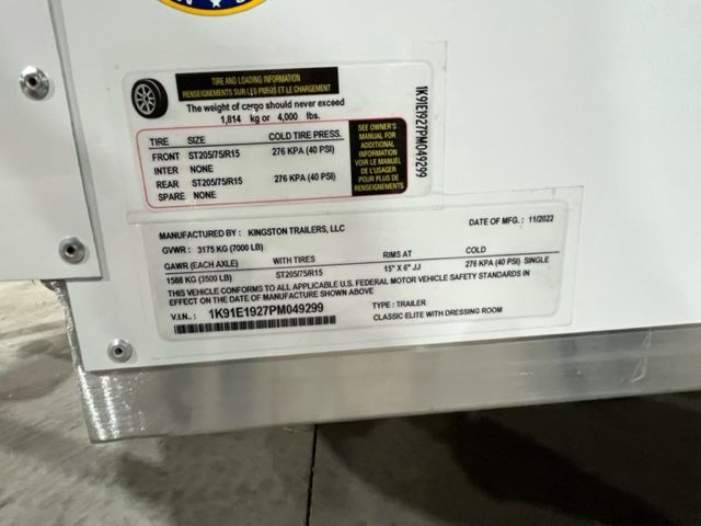 A white box with a license plate on it