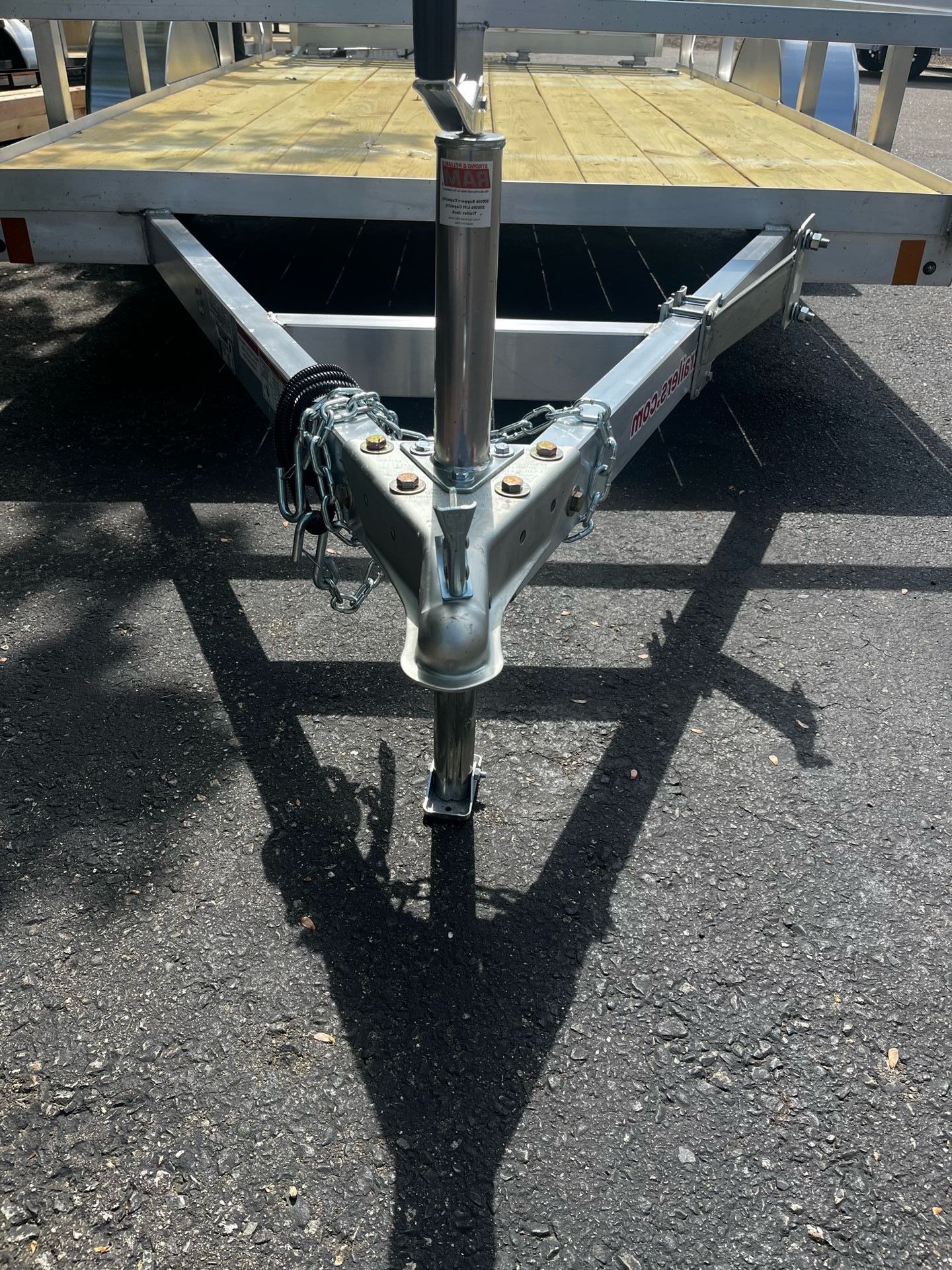 A trailer is parked on the side of the road