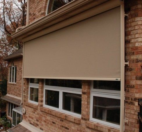A residential window equipped with a solar screen