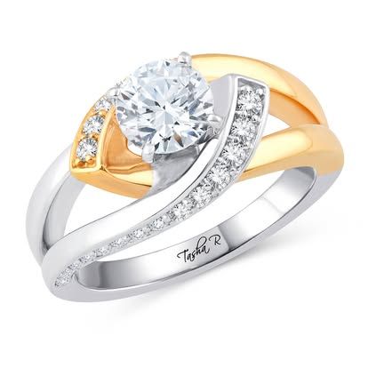 Two-tone diamond engagement ring with a large center stone and smaller diamonds on the band.