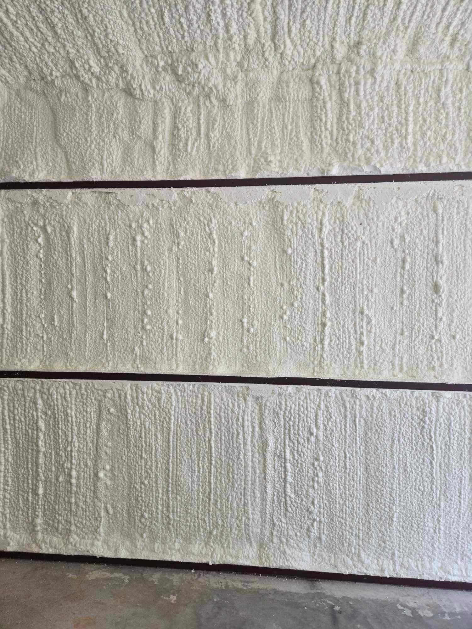 A wall with a lot of foam on it.