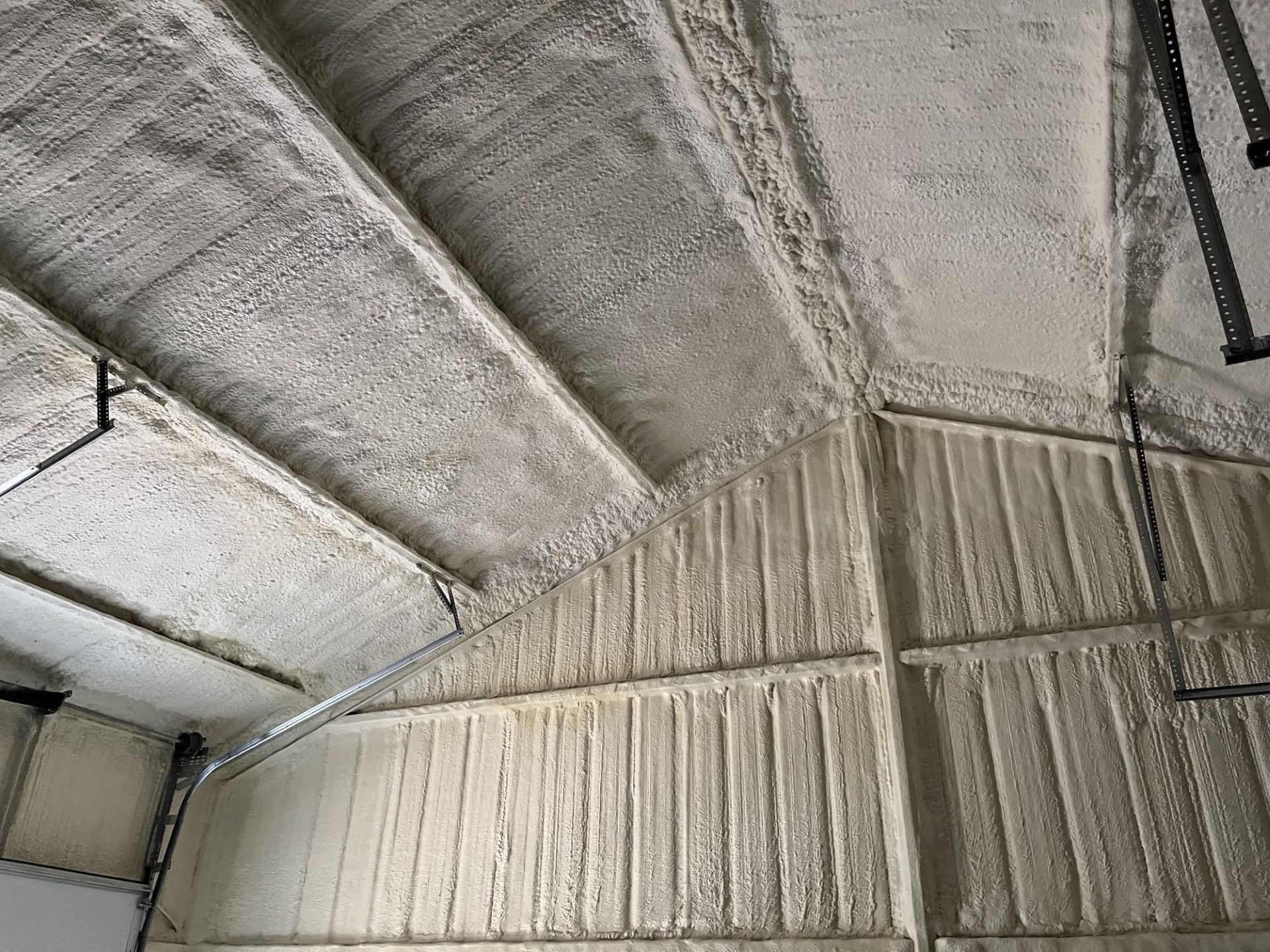 quality spray foam insulation installation on ceiling and walls