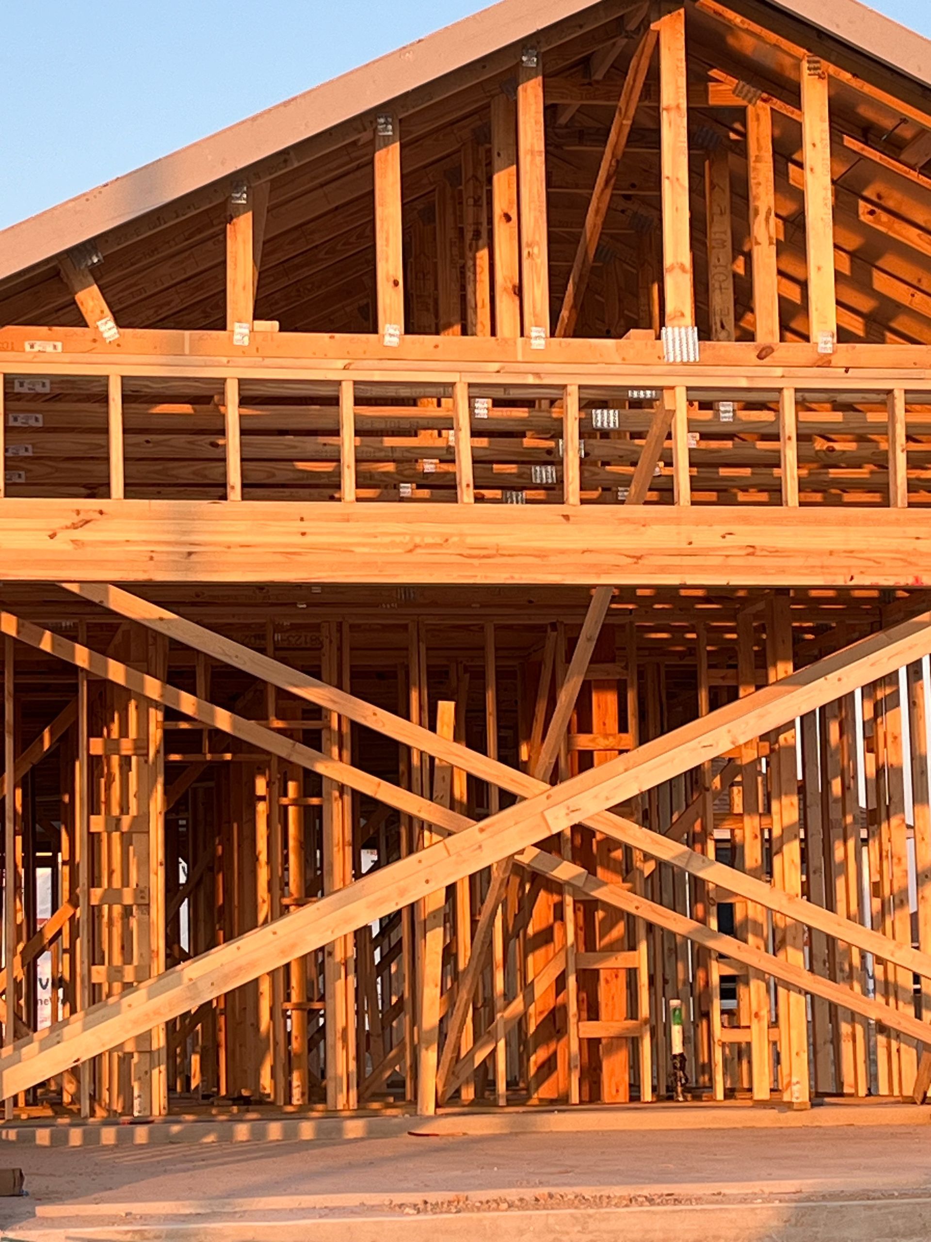 A house that is being built with wooden beams