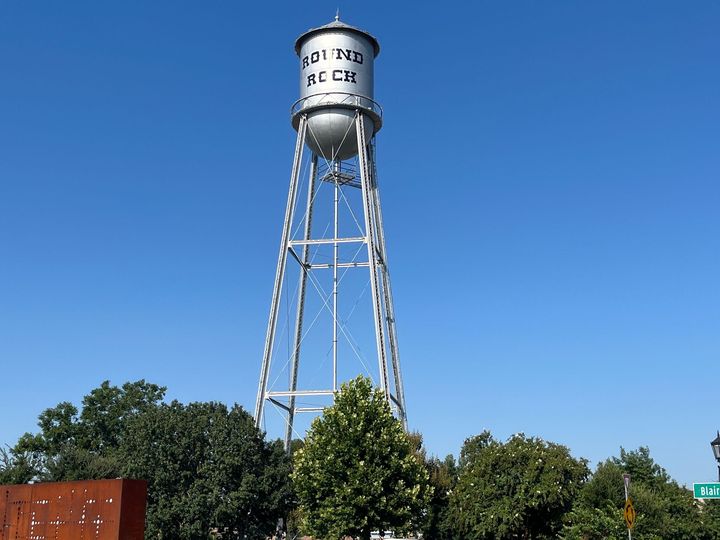 A water tower with the word texas on it