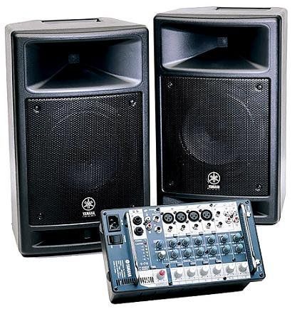 Two black Yamaha speakers and a small mixing console.