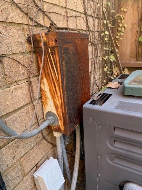 Improper heater installation covering electrical box access