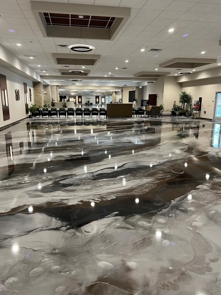 A large room with a marble floor and ceiling.