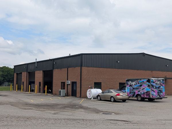 Shine One Truck Wash & Polish Shop's brick building