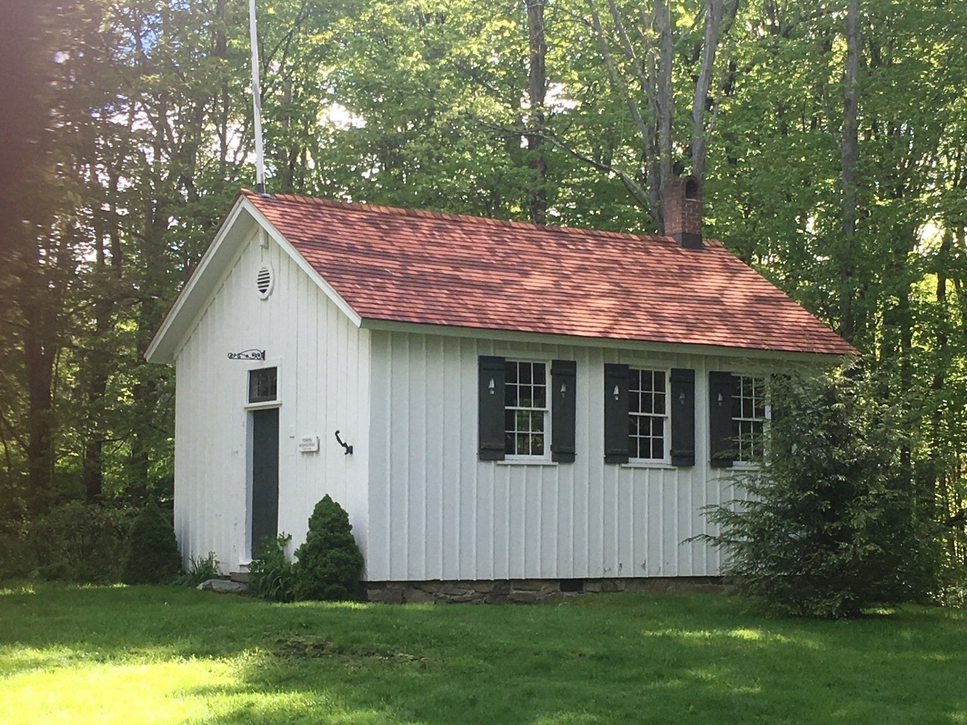 Small building with white siding