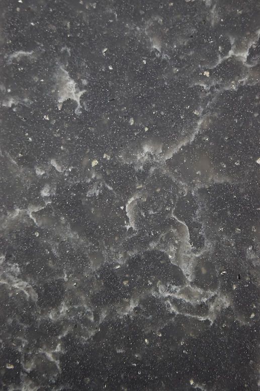 A close up of a black and white marble texture.