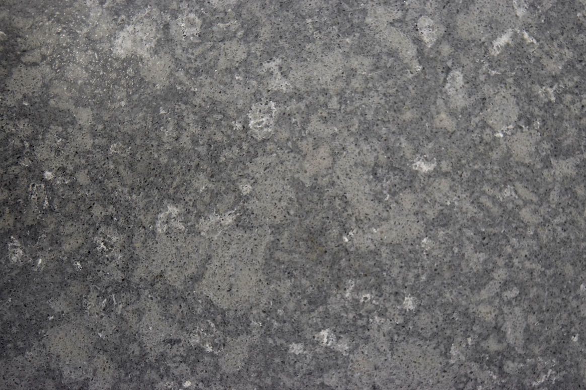 A close up of a gray granite counter top.