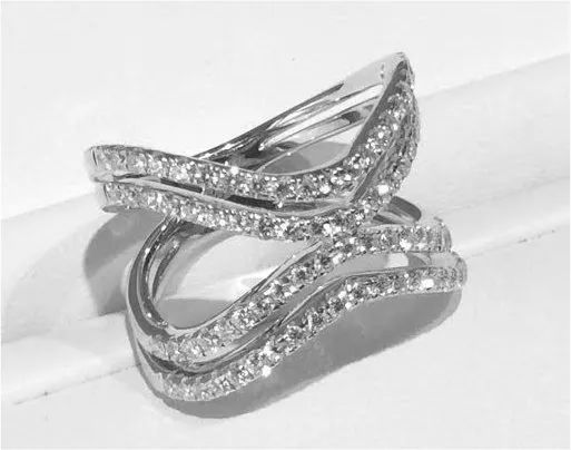 a white gold ring with diamonds on it