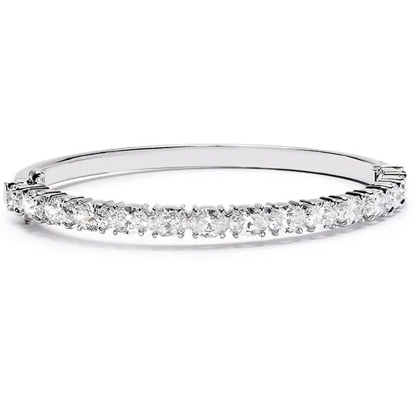 a white gold bangle bracelet with diamonds on a white background