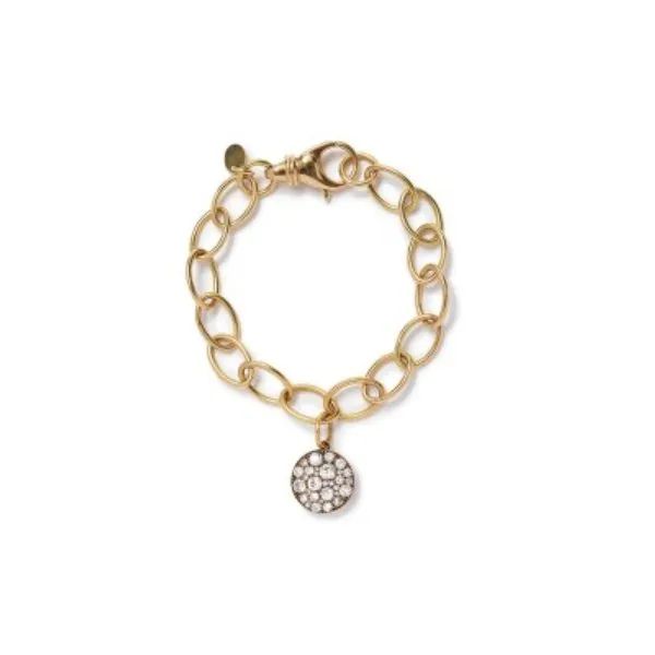 a gold bracelet with a round pendant with diamonds on it