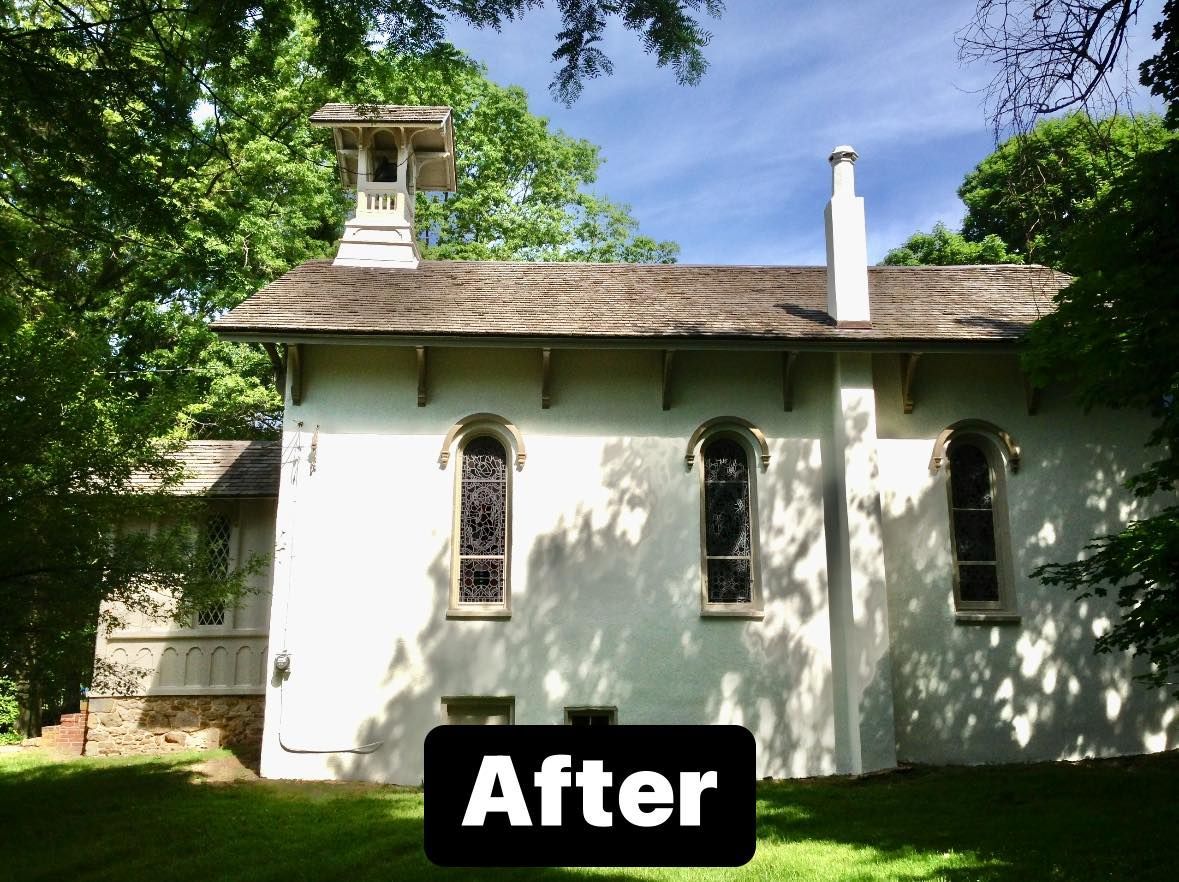 A white building with a sign that says after