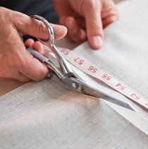 cutting fabric using scissors