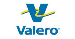 Valero logo with blue V and yellow swoosh above blue wordmark on white background