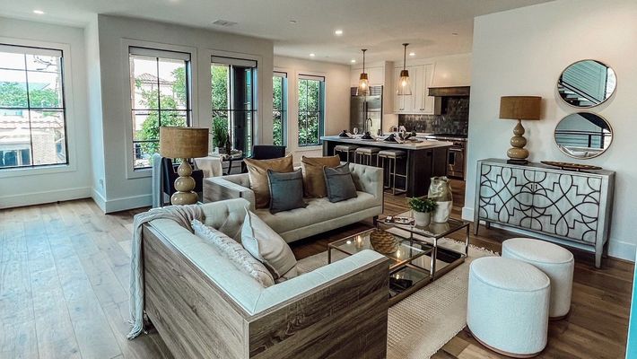 A living room filled with furniture and a couch.