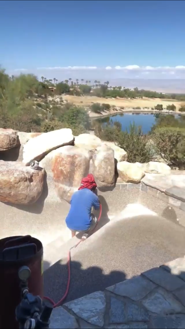 Sandblasting pool tile cleaning