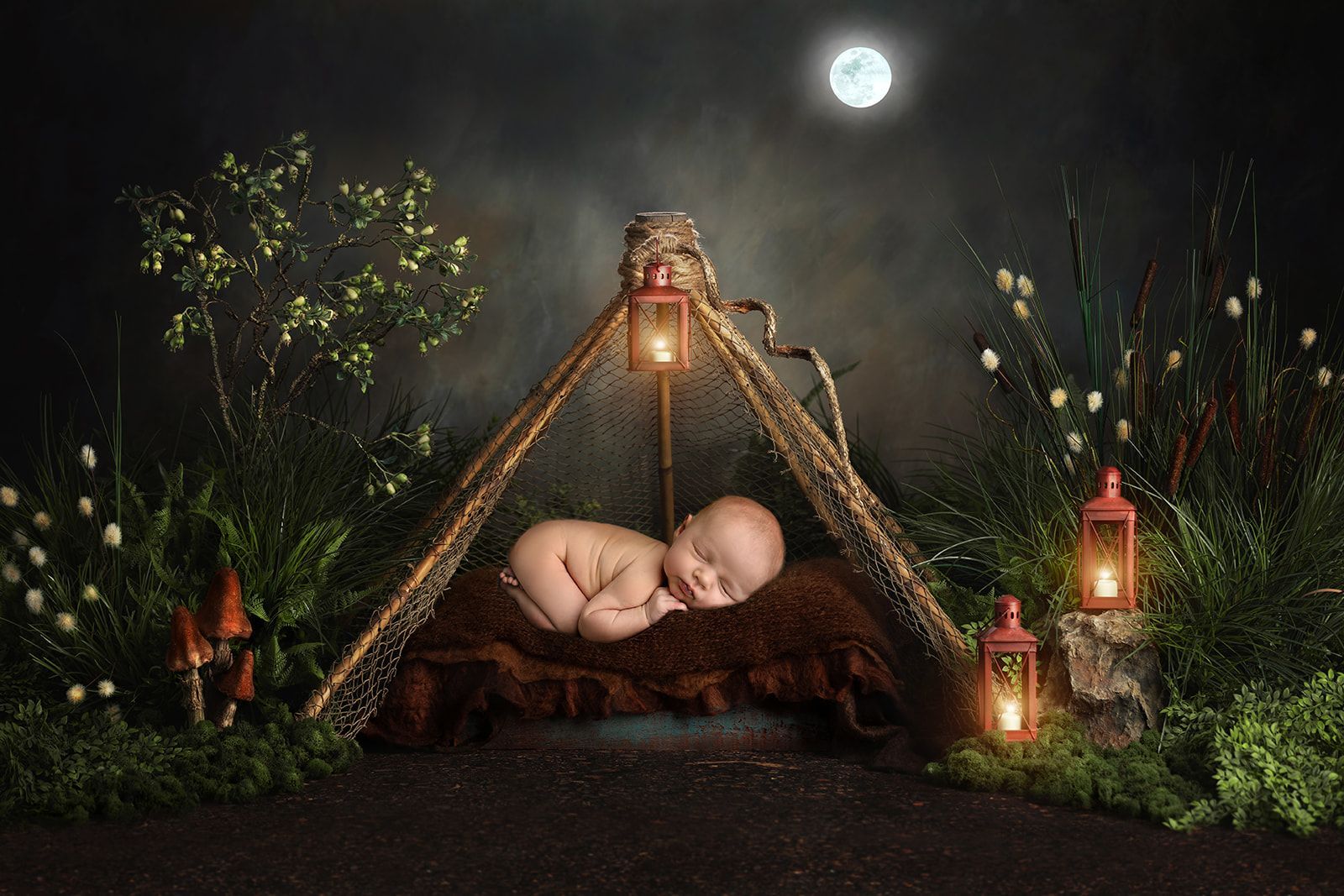Sleeping baby in a rustic teepee at night, lit by lanterns under a moonlit sky.