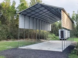 A carport with a white roof