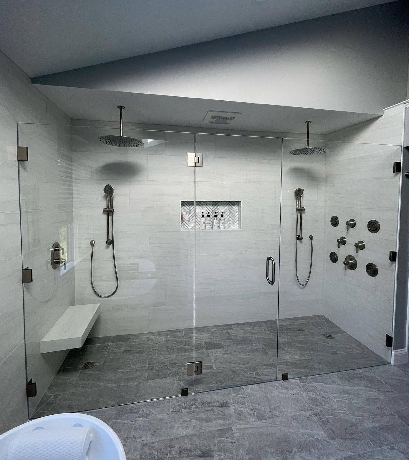 A bathroom with a walk-in shower.