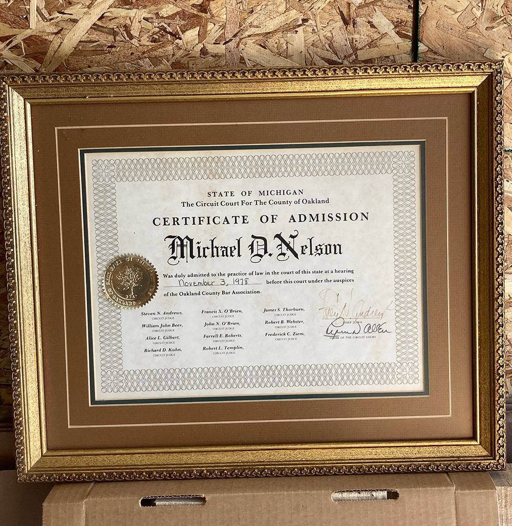 A framed certificate of admission for Michael Nelson