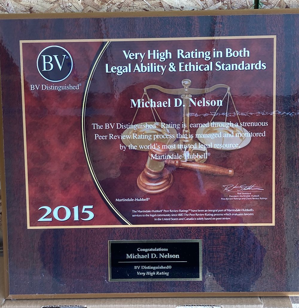 A plaque that says very high rating in both legal ability and ethical standards