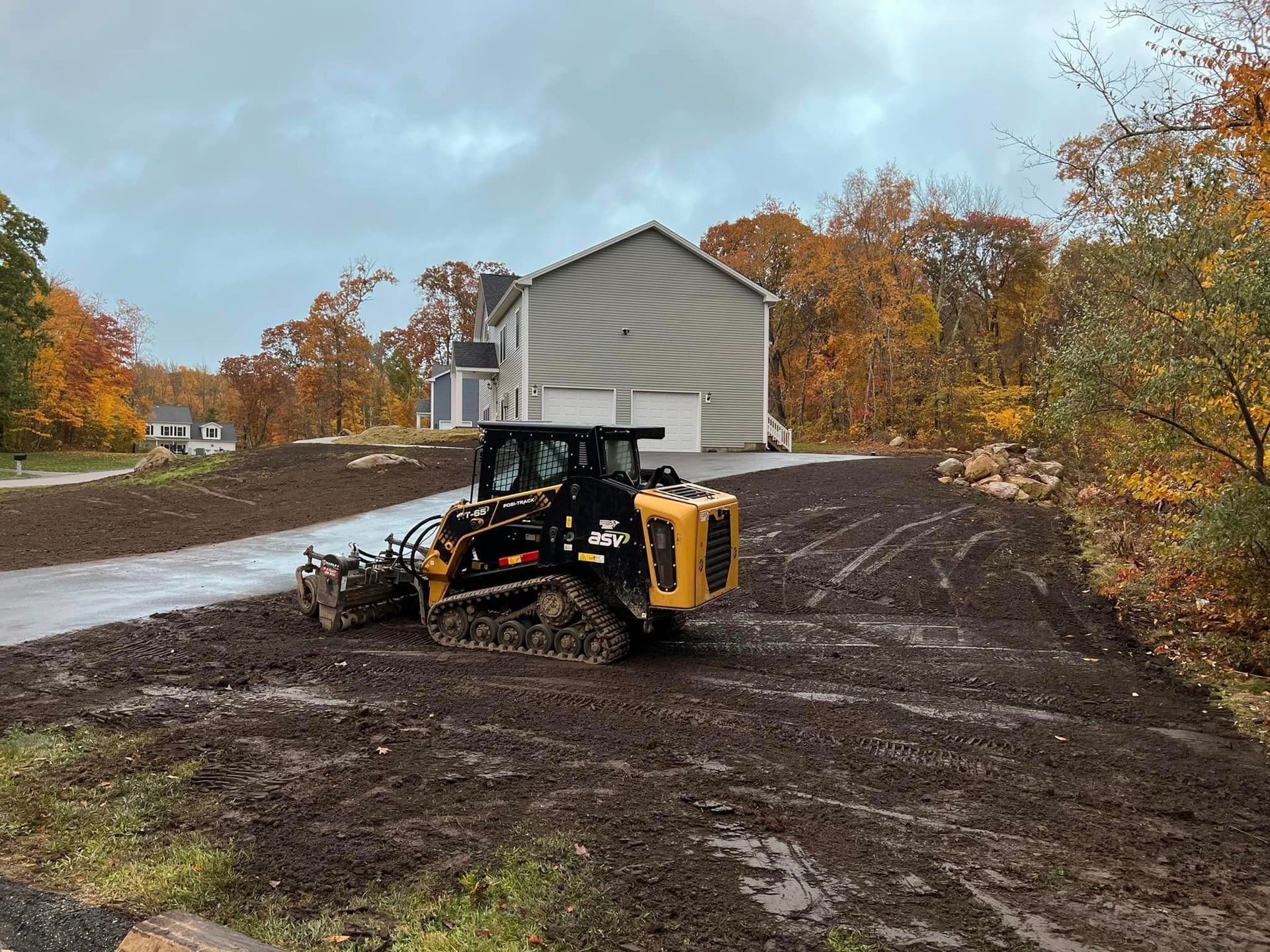 Skid steer parked outside