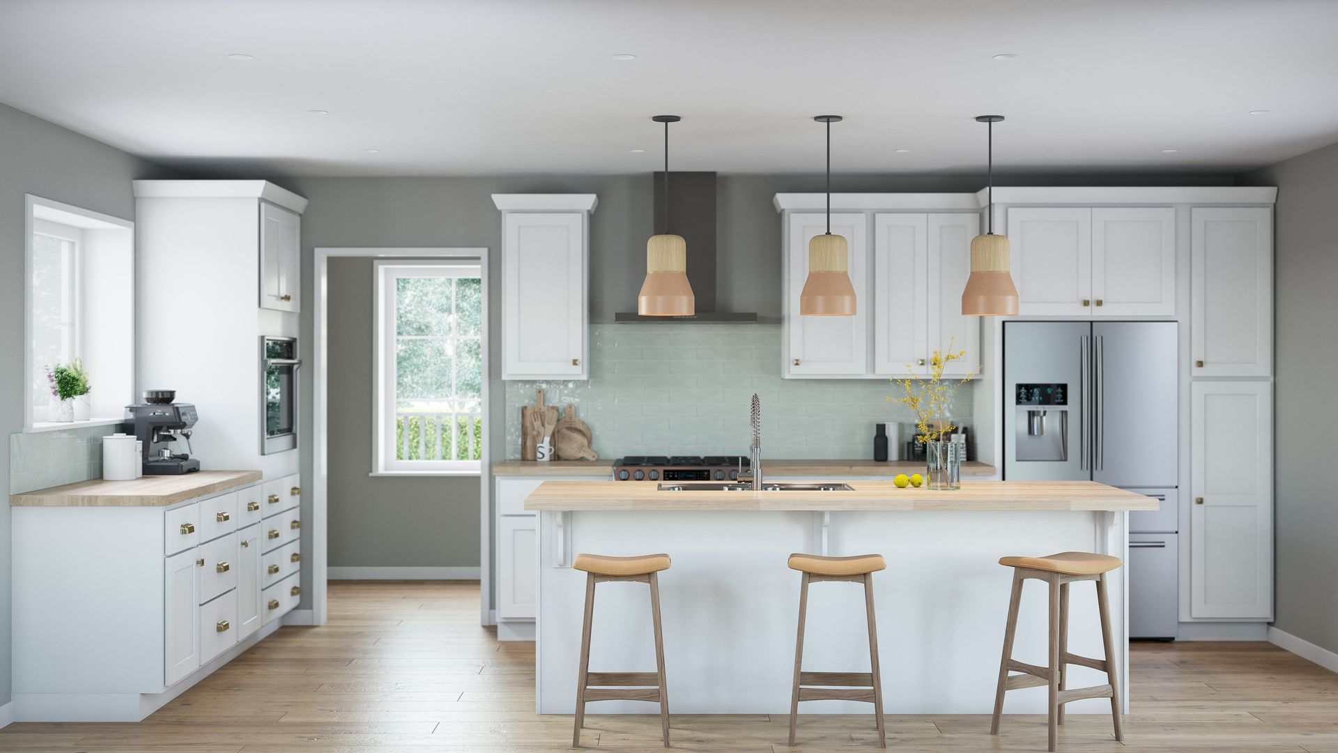 A kitchen with white cabinets , stools , a refrigerator , and a large island.