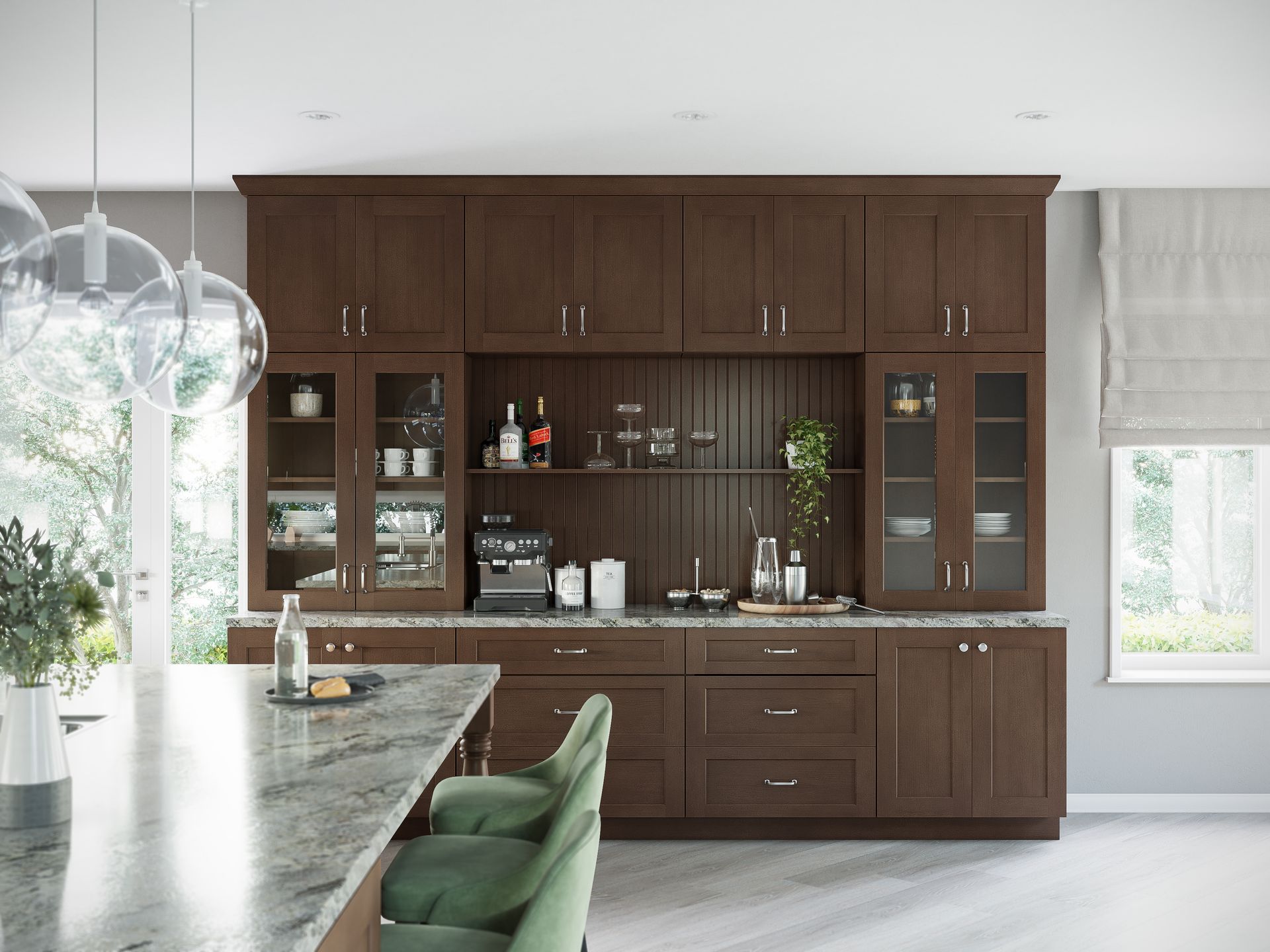 A kitchen with lots of cabinets and a large island.