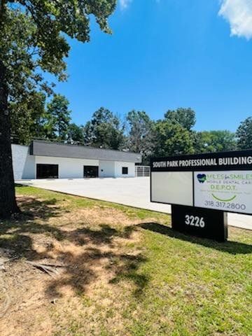 Miles For Smiles LLC's office and signage