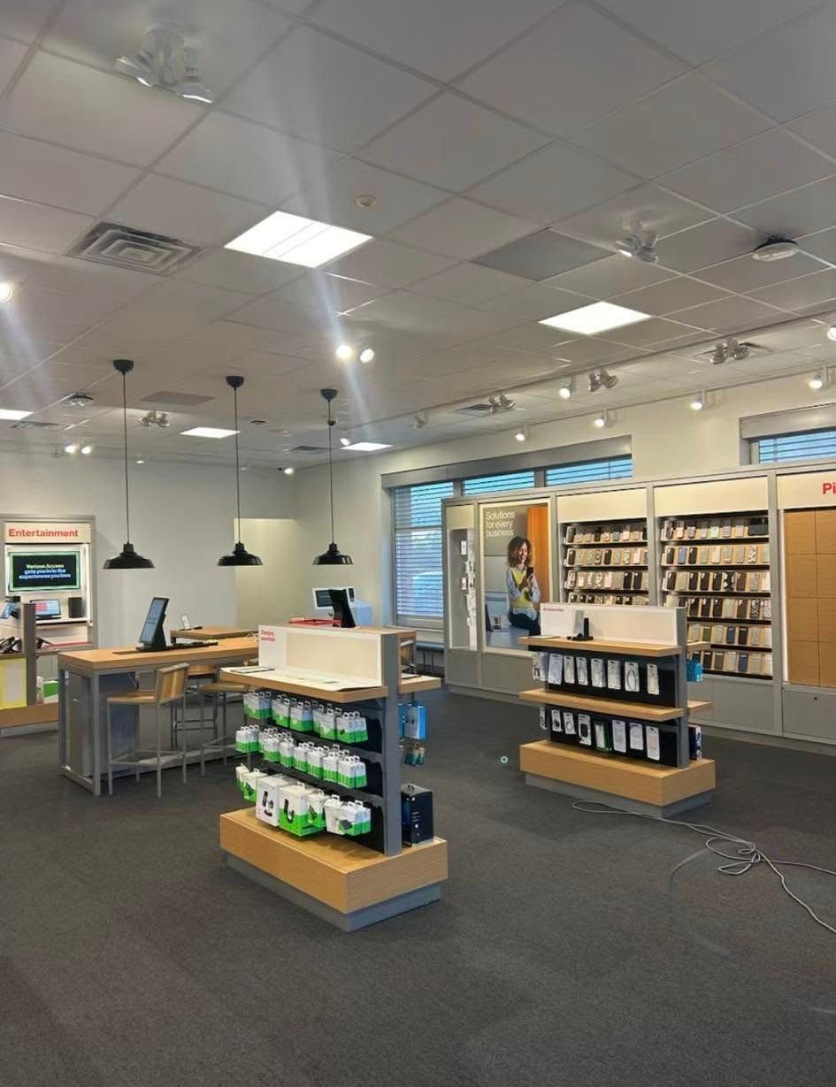 A store with a lot of shelves and a counter