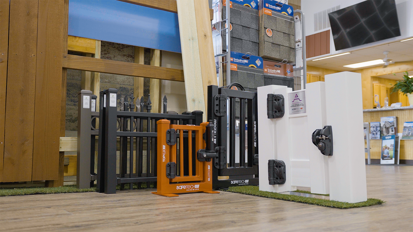 A bunch of fences are sitting on the floor in a room.