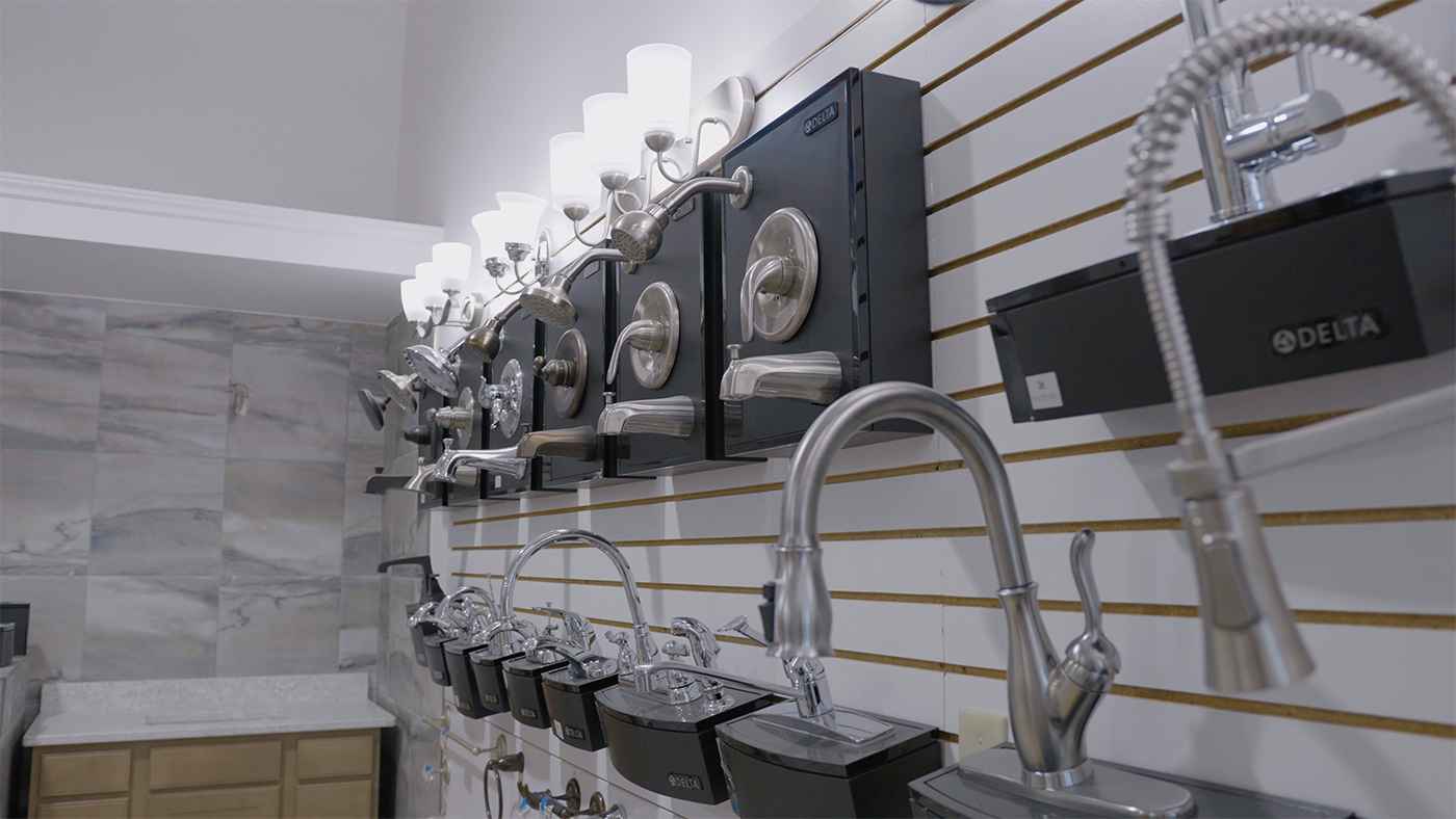 A showroom filled with lots of faucets and lights.