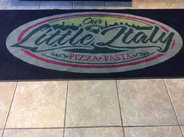 A little italy pizza and pasta logo on a mat
