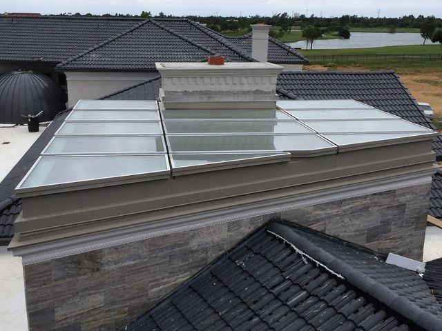 Looking up at the sky through a skylight