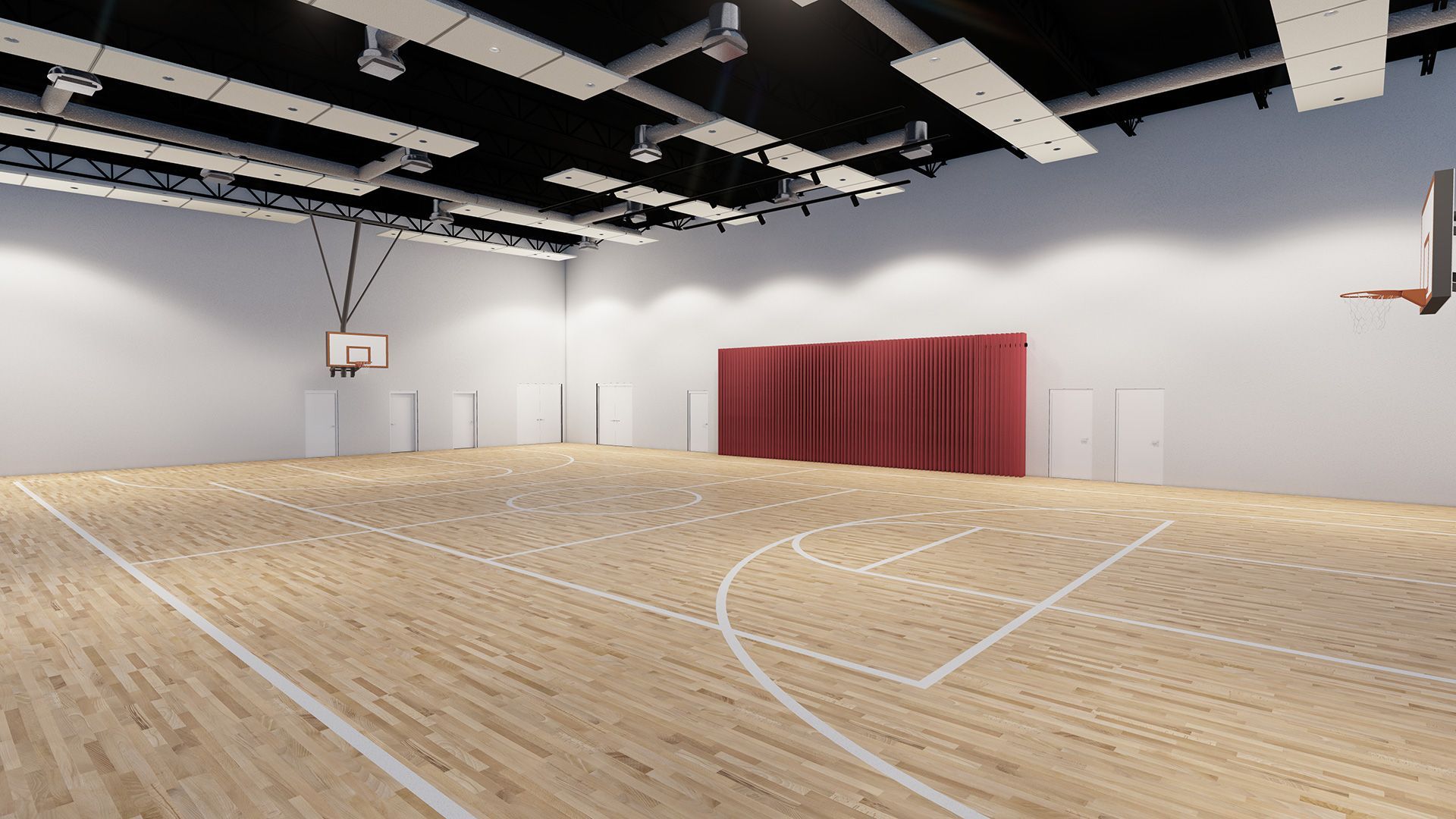 Wooden basketball court with lines, hoops, and red curtains against white walls.