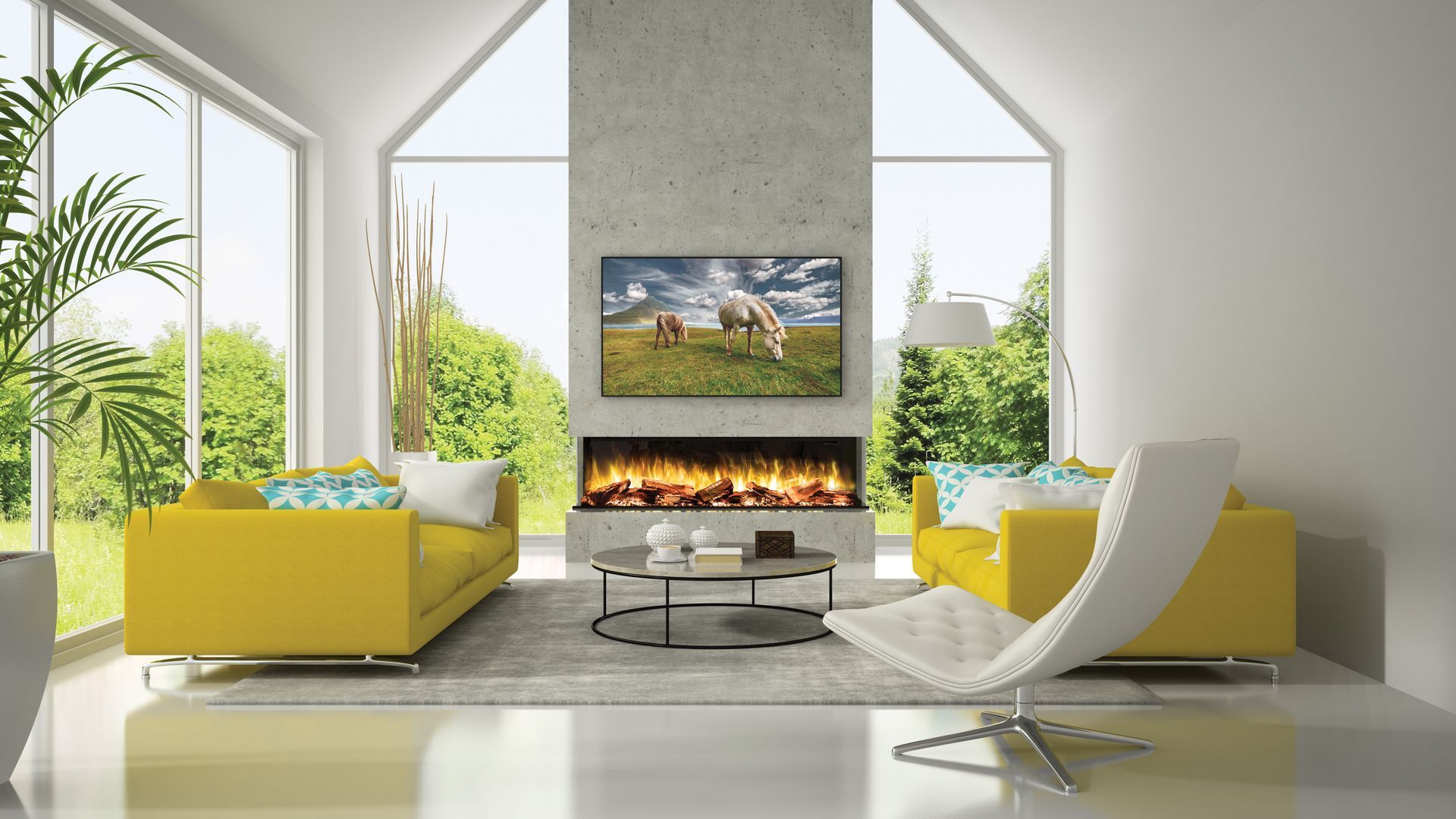 A living room with yellow couches , a chair , a fireplace and a flat screen tv.