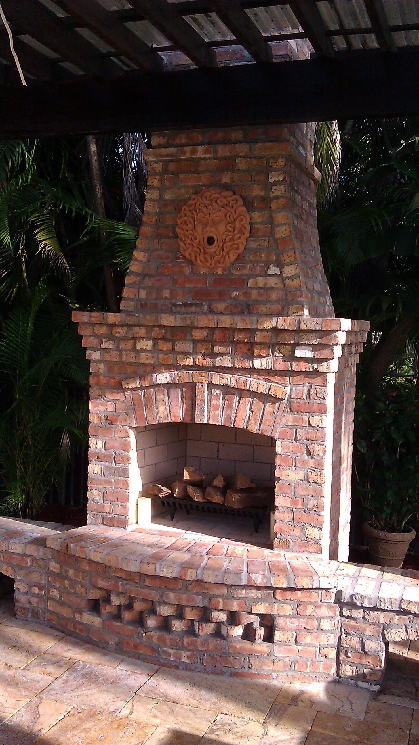 Traditional brick outdoor fireplace in Fort Lauderdale, FL.