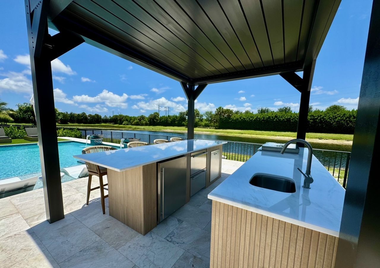 cozy patio with fan and seating in Boynton Beach, FL.